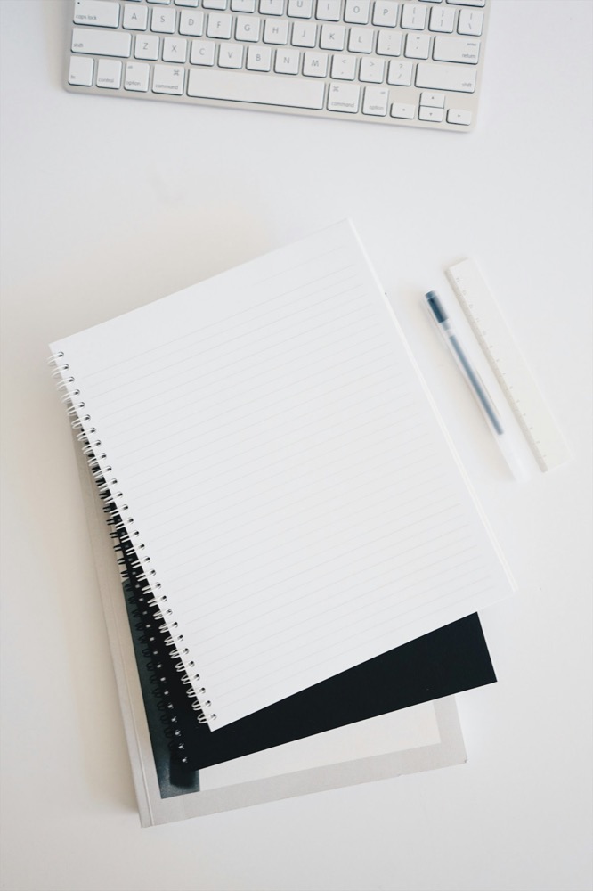 An open notebook and pen ready for focused work