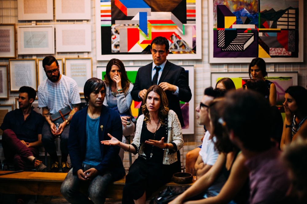 A group meeting together in a bright, collaborative training session