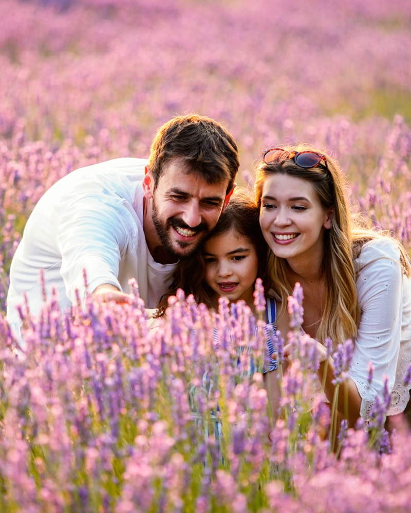 A family bonding together outdoors, representing family and attachment therapy